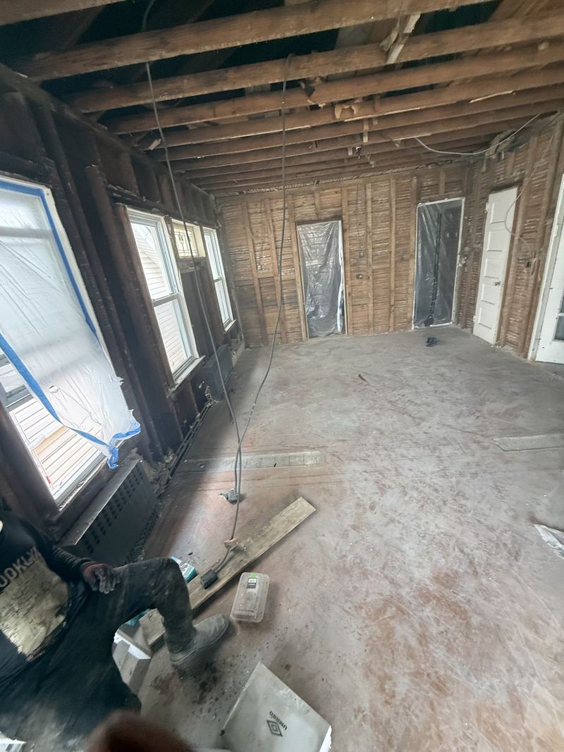 Room stripped to the studs after interior demolition and clean-up